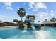 Refreshing pool with a fun waterslide feature at 7401 Paradiso Dr, Apollo Beach, FL 33572