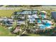 Resort-style pool, tennis courts, and playground at 7401 Paradiso Dr, Apollo Beach, FL 33572