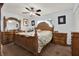 Large bedroom with a king-size bed and matching dresser at 7839 Knox Loop, New Port Richey, FL 34655