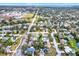 Aerial view showing home's location in a residential neighborhood near the coast at 809 Audubon St, Clearwater, FL 33764