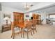 Classic dining room with a wooden table and chairs, adjacent to kitchen at 8236 Brentwood Rd, Seminole, FL 33777