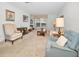 Inviting living room with neutral color palette and ample seating at 8236 Brentwood Rd, Seminole, FL 33777