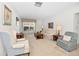 Bright and airy living room with comfortable seating and large window at 8236 Brentwood Rd, Seminole, FL 33777