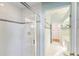 Clean bathroom with a glass shower door and tiled walls at 843 Harbor Is, Clearwater Beach, FL 33767