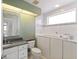 Bathroom with walk-in shower and modern vanity at 843 Harbor Is, Clearwater Beach, FL 33767
