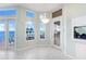 Elegant dining area with water views and chandelier at 843 Harbor Is, Clearwater Beach, FL 33767