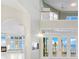 Grand two-story entry with built-in aquarium and water views at 843 Harbor Is, Clearwater Beach, FL 33767