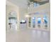 Bright entryway with high ceilings and built-in aquarium at 843 Harbor Is, Clearwater Beach, FL 33767