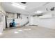 Spacious garage with ample storage and a staircase to the upper level at 843 Harbor Is, Clearwater Beach, FL 33767