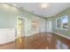 Spacious living area with hardwood floors and access to bathroom at 843 Harbor Is, Clearwater Beach, FL 33767