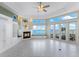 Spacious living room with fireplace and stunning water views at 843 Harbor Is, Clearwater Beach, FL 33767