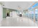 Spacious living room with fireplace and water views at 843 Harbor Is, Clearwater Beach, FL 33767