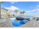 Inviting kidney-shaped pool with spa and waterfront views at 843 Harbor Is, Clearwater Beach, FL 33767