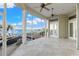 Spacious screened porch overlooking the pool and waterfront at 843 Harbor Is, Clearwater Beach, FL 33767