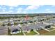 Aerial view showcasing home's location in a quiet neighborhood at 9512 Lemon Drop Loop, Ruskin, FL 33573