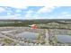 Aerial view highlighting the property's proximity to a lake at 9512 Lemon Drop Loop, Ruskin, FL 33573