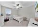 Charming bedroom with a bed, toys, and a bookcase at 9512 Lemon Drop Loop, Ruskin, FL 33573