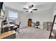 Bright bedroom featuring a workspace and ample storage at 9512 Lemon Drop Loop, Ruskin, FL 33573