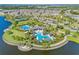 Community pool and recreation area with playground at 9512 Lemon Drop Loop, Ruskin, FL 33573