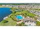 Resort-style community pool with expansive sundeck at 9512 Lemon Drop Loop, Ruskin, FL 33573