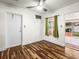Bedroom with hardwood floors and access to backyard at 9909 48Th N Ave, St Petersburg, FL 33708