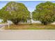 House exterior with landscaping and a mailbox at 9909 48Th N Ave, St Petersburg, FL 33708
