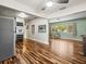 Kitchen with stainless steel refrigerator and hardwood floors at 9909 48Th N Ave, St Petersburg, FL 33708