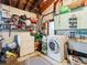 Laundry room with washer, dryer, and ample storage at 9909 48Th N Ave, St Petersburg, FL 33708