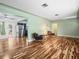 Spacious living area with hardwood floors and stylish furniture at 9909 48Th N Ave, St Petersburg, FL 33708