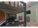 bedroom with bunk beds and ample storage at 10107 N Arden Ave, Tampa, FL 33612