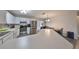 Kitchen boasts a large island and stainless steel appliances at 10107 N Arden Ave, Tampa, FL 33612