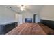 Large main bedroom with a king-size bed and walk-in closet at 10107 N Arden Ave, Tampa, FL 33612