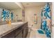 Bathroom with shower, vanity and decorative shower curtain at 10832 Sage Canyon Dr, Riverview, FL 33578