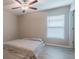 Cozy bedroom with neutral decor and ample natural light at 10832 Sage Canyon Dr, Riverview, FL 33578