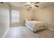 Bright bedroom with light flooring and ceiling fan at 10832 Sage Canyon Dr, Riverview, FL 33578