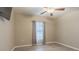 Simple bedroom with window and ceiling fan at 10832 Sage Canyon Dr, Riverview, FL 33578