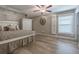 Relaxing main bedroom with neutral tones and ensuite bathroom at 10832 Sage Canyon Dr, Riverview, FL 33578