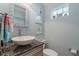 Powder room with vessel sink and decor at 1109 Pinellas Bayway S # 403, Tierra Verde, FL 33715