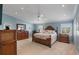 Bright and airy main bedroom with wood furniture and plenty of light at 1109 Pinellas Bayway S # 403, Tierra Verde, FL 33715