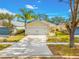 Single-story house with a two-car garage and well-maintained lawn at 11310 Palm Island Ave, Riverview, FL 33569