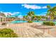 Relaxing resort-style pool with spacious deck and lounge seating at 11310 Palm Island Ave, Riverview, FL 33569