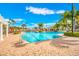 Large, refreshing pool with a leisure area and palm trees at 11310 Palm Island Ave, Riverview, FL 33569