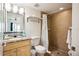 Shower stall, granite vanity, and linen shelf at 11605 Gulf Blvd # 302, Treasure Island, FL 33706