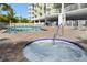 Refreshing pool and hot tub, perfect for relaxation at 11605 Gulf Blvd # 302, Treasure Island, FL 33706