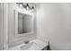 Simple bathroom with vanity, mirror and updated countertop at 12509 Bay Branch Ct, Tampa, FL 33635