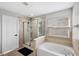 Bathroom with shower and garden tub at 12509 Bay Branch Ct, Tampa, FL 33635