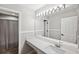 Bathroom with single vanity and a large mirror at 12509 Bay Branch Ct, Tampa, FL 33635