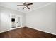 Home office with hardwood floors and French doors at 12509 Bay Branch Ct, Tampa, FL 33635