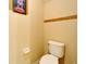 Small half bathroom with toilet and wall decor at 12610 Geneva Glade Dr, Riverview, FL 33578