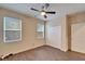 Spacious bedroom with double door closet and wood-look floors at 12610 Geneva Glade Dr, Riverview, FL 33578